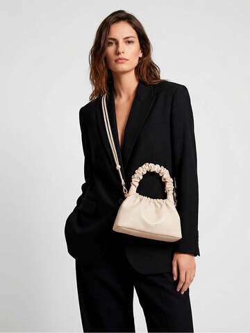 PLIEGO DE LA ROSA Handbag in Beige