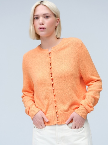 Next Pletena jopa | oranžna barva: sprednja stran