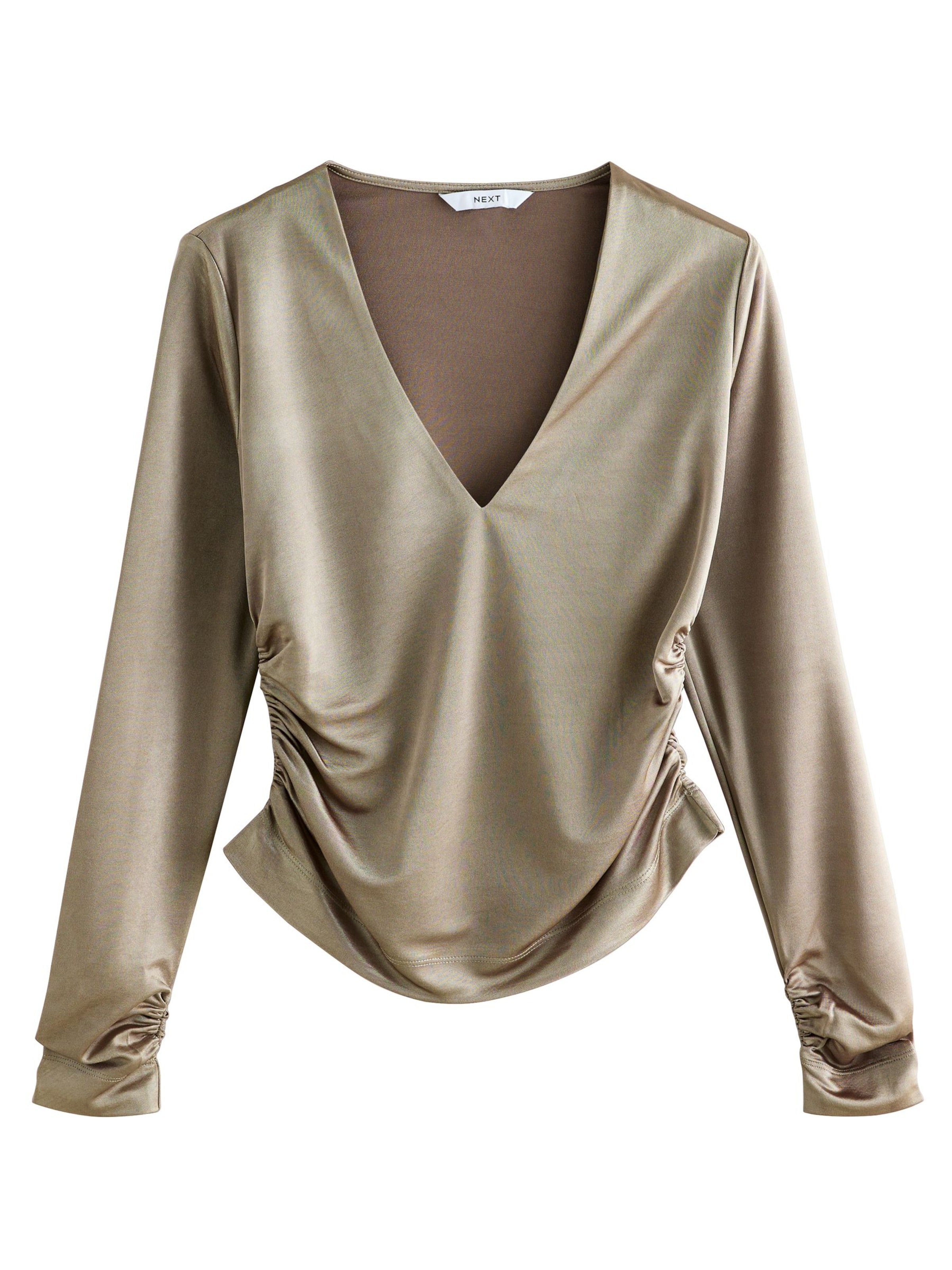 Next Blus i guld: framsida