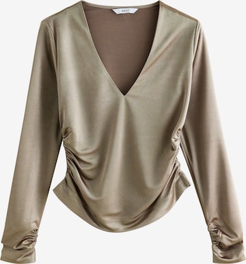 Next Blus i guld: framsida