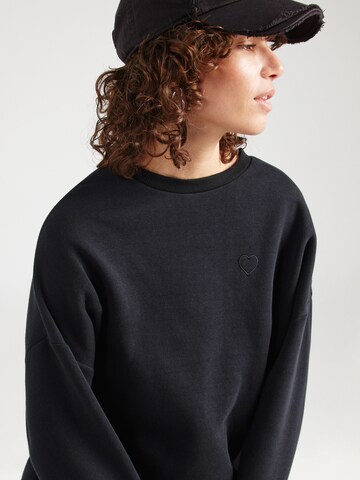 PIECES - Sweatshirt 'DINNA' em preto