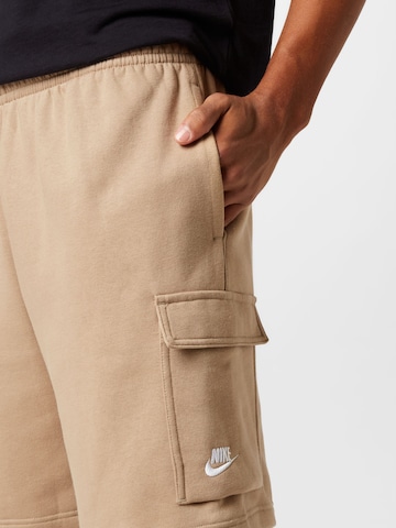 Loosefit Pantaloni cu buzunare de la Nike Sportswear pe maro