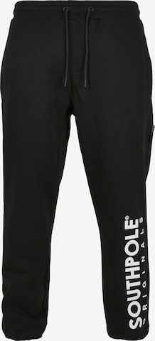 Loosefit Pantaloni de la SOUTHPOLE pe negru: față