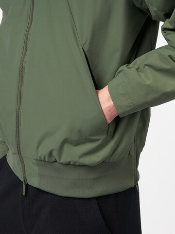 Veste fonctionnelle pinqponq en vert