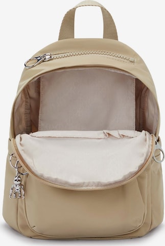 KIPLING Reppu 'DELIA MINI' värissä beige