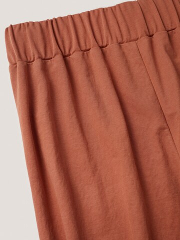 MANGO Široke hlačnice Hlače 'Cintia' | oranžna barva