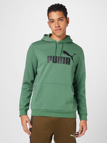 PUMA Sports sweatshirt 'ESSENTIAL' in Green: front