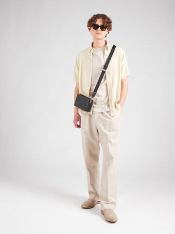 BOSS - Camiseta 'Taut 80' en beige