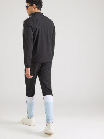 Sergio Tacchini Облекло за трениране в черно