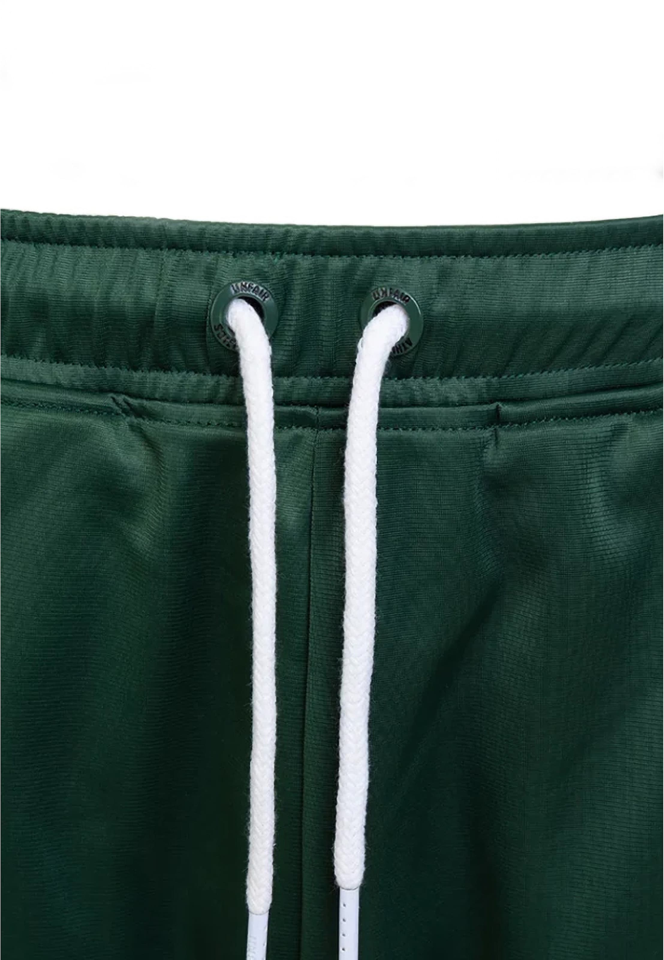 Loosefit Pantaloni sportivi 'DMWU Evolution' di Unfair Athletics in verde