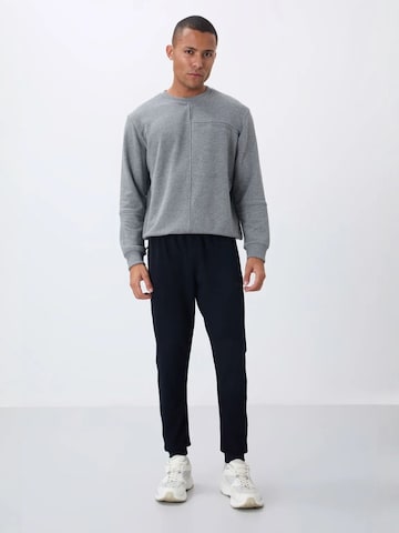 Regular Pantalon de sport Tommy Life en noir