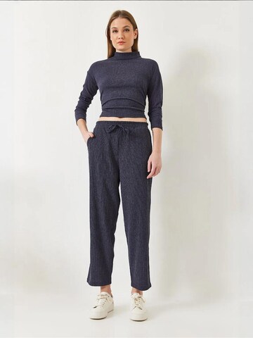 Bianco Lucci - Calças de fato em azul: frente