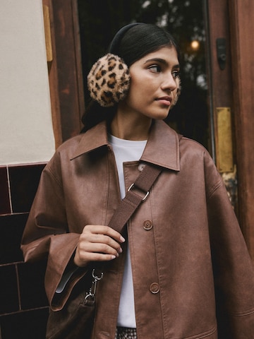 Urechiușe de la Next pe maro