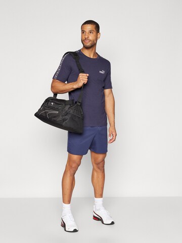 PUMA T-Shirt 'ESS Tape' in Blau