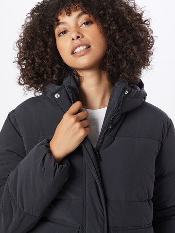 Champion Authentic Athletic Apparel Jacke in Schwarz