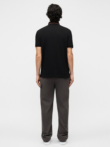 ARMANI EXCHANGE Poloshirt in Schwarz