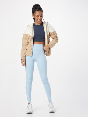 Girlfriend Collective Skinny Sporthose in Blau