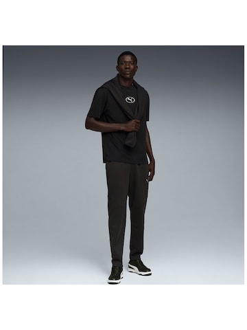 PUMA Regular Sports trousers 'Puma Evostripe Warm Pants' in Black