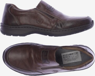 Rieker Flats & Loafers in 44 in Brown: front