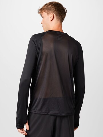 T-Shirt fonctionnel Reebok en noir