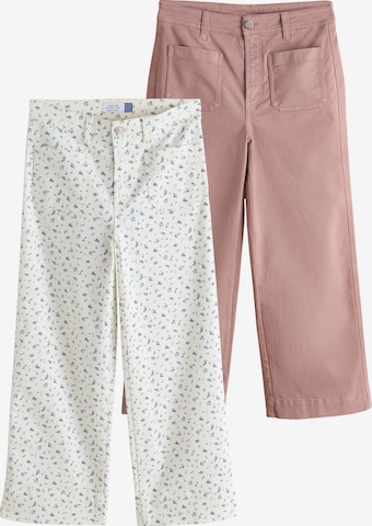 Jean Next en rose : devant