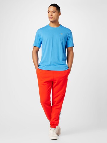 LACOSTE - Tapered Pantalón en rojo