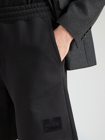HUGO Loosefit Παντελόνι 'Darix' σε μαύρο