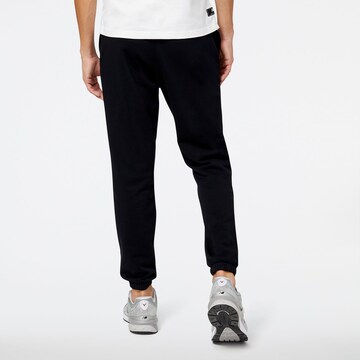 new balance Tapered Sporthose 'NB Hoops Fundamentals Pant' in Schwarz