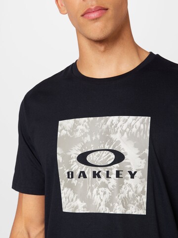 OAKLEY Λειτουργικό μπλουζάκι 'WANDERLUST' σε μαύρο