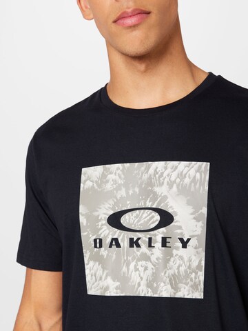 Tricou funcțional 'WANDERLUST' de la OAKLEY pe negru