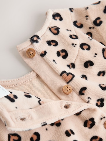 Tutina / body per bambino di Next in beige