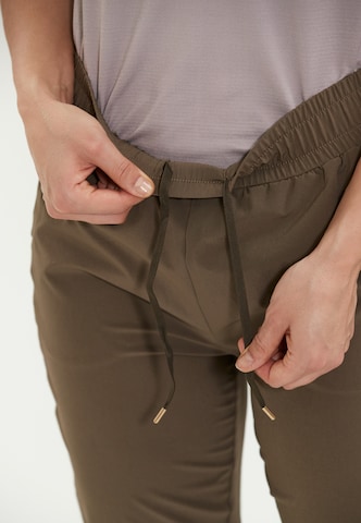 Athlecia Regular Workout Pants 'Timmie' in Brown