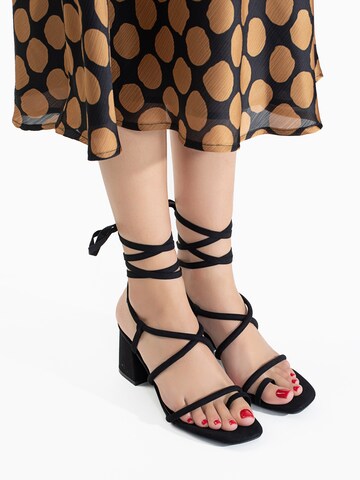 Celena Strap Sandals in Black: front