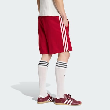 ADIDAS ORIGINALSregular Hlače 'Firebird' - crvena boja