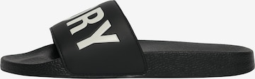 Claquettes / Tongs Superdry & Co en noir : devant
