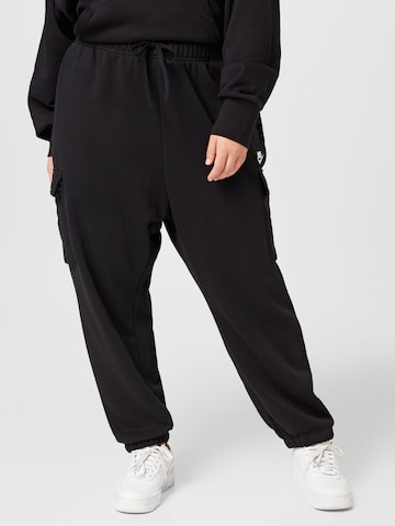 Nike Sportswear Tapered Cargo Pants in Black: front