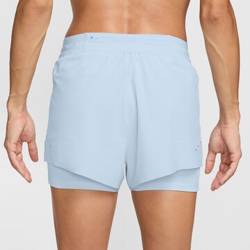 NIKE Regular Workout Pants 'Swift' in Blue