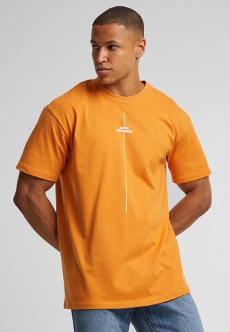 Merchcode Shirt 'Think Different' in Orange