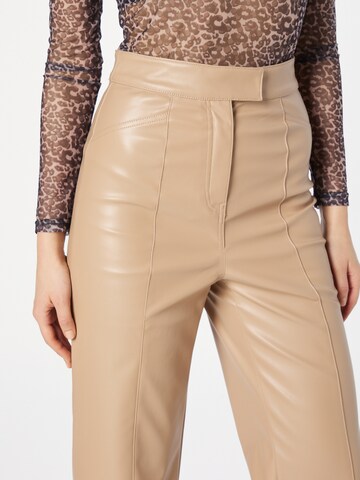 River Island - Tapered Pantalón plisado en marrón