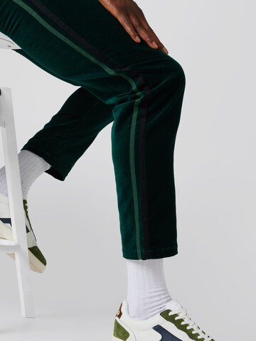 Sinned x ABOUT YOU Regular Pants 'Luca' in Green