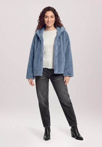 Cartoon Tussenjas in Blauw