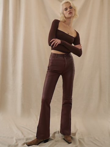 Kendall for ABOUT YOU Boot cut Pants 'Dita' in Brown