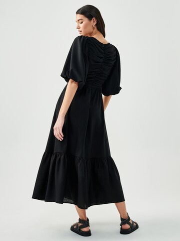 St MRLO Kleid in Schwarz: Rückseite