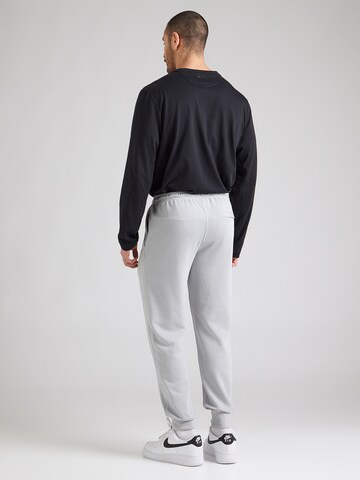 Nike Sportswear Ozke Hlače 'Club Fleece' | siva barva