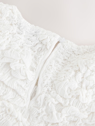 Haut Next en blanc