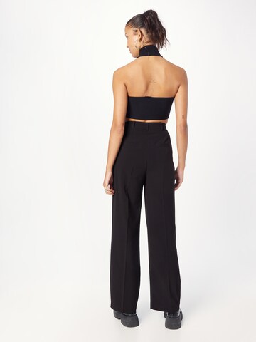 Wide leg Pantaloni cu dungă de la Warehouse pe negru