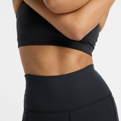 new balance Pantalon de sport 'Harmony' en noir, Vue avec produit