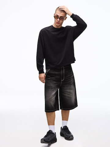 Bershka Široke hlačnice Kavbojke | črna barva: sprednja stran