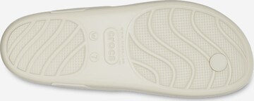 Crocs T-Bar Sandals in Beige