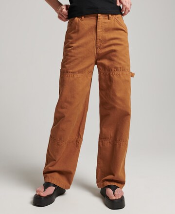 Superdry Loose fit Pants in Brown: front